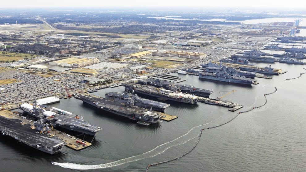 UNE GUERRE SANS CANONS, MAIS AVEC DES CHAÎNES DE VALEUR 9 flattops at norfolk naval base december 20 2012 990x556
